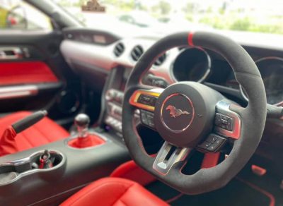 Custom design steering wheel- By Eximius. Alcantara leather - red racing stripe. For the Mustang GT.