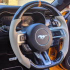 Custom design steering wheel- By Eximius. Creame leather orange stripe with carbon.