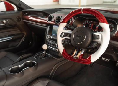 Custom design steering wheel- By Eximius. Red Carbon, White Leather. Ruby Mustang.