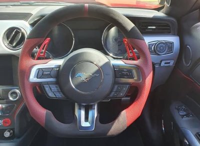 Custom design steering wheel- By Eximius. Leather and Alcantara. Ruby Mustang.