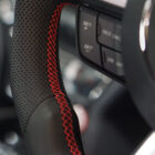 Custom design steering wheel- By Eximius. Leather. Red Stitching.